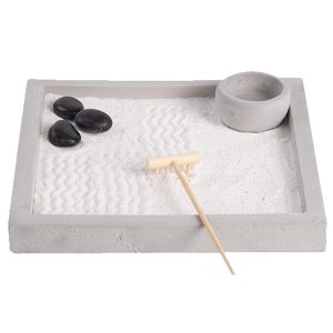 Relax and clear your mind with this tabletop meditation Garden Keep your stress levels down with this Mini Japanese Zen Garden Kit! Spend hours raking and rearranging your mini garden over and over again. The Japanese zen garden has several philosophies behind the design but in Western culture it is mainly recognised as a form of meditation. Includes a tray, planter, stones, rake and sand Everything needed to ensure raking patterns in the sand and has a calming effect and helps with self-reflection, these table top versions make great gifts for stressed out friend! Great gift for people with high anxiety and to reduce stress Suitable for all ages and a great Birthday gift for him or her Measures approx. 24 cm x 24 cm x 4 cm Comes in a lovely gift box to pack for a Christmas gift or stocking filler