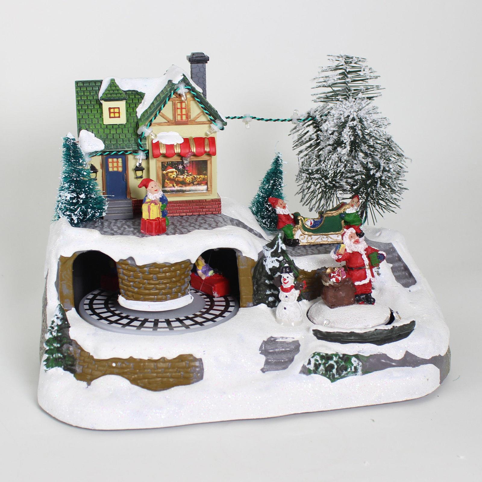 Christmas 23cm Battery Operated LED Lit Village Scene - Shop